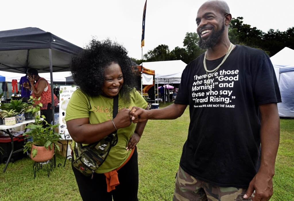 01 Two people pose at grand opening of Mask Melanin Market in Glassboro.