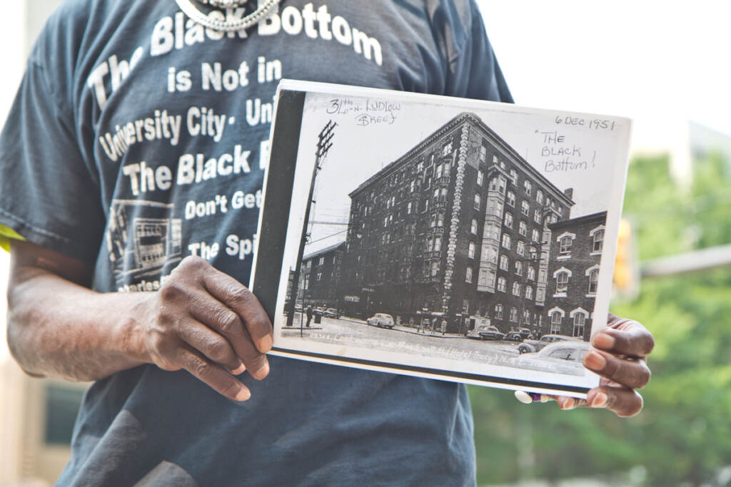 2021 08 04 k paynter black bottom portrait stills-2 Andre Black holds a photo of Philadelphia’s Black Bottom neighborhood