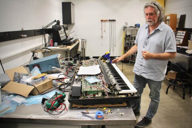 Drew Raison shows a disassembled Polymood keyboard
