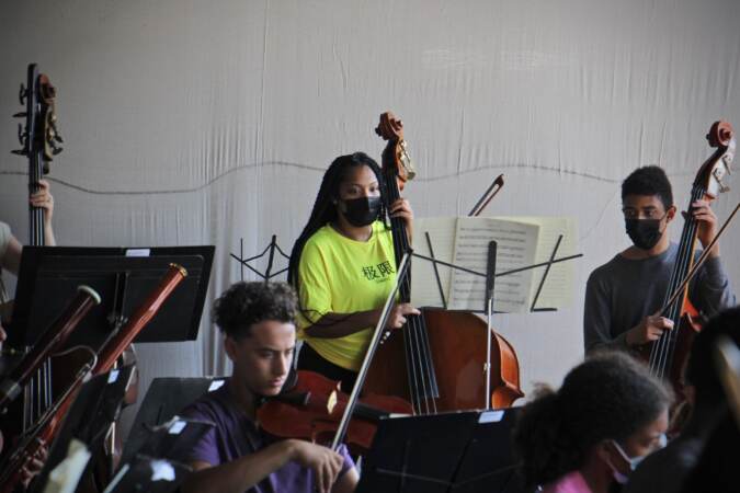 Bassist Lashawnna Levy practices with members of the Philadelphia Orchestra