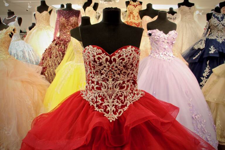 Quinceañera dresses dazzle in a crowded floor display