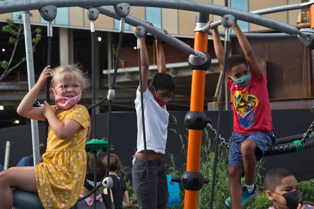 Elementary school students play on the playground