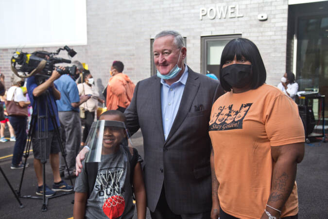 Julian Quann, 7, and his mom Sade Benson posed with Philadelphia Mayor Jim Kenney