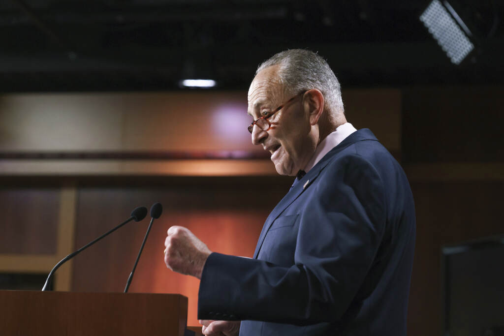 Senate Majority Leader Chuck Schumer, D-N.Y., meets with reporters after a marathon “vote-a-rama” to advance President Joe Biden’s federal priorities, at the Capitol in Washington, Wednesday, Aug. 11, 2021. The Democratic leader discussed the $3.5 trillion framework for bolstering family services, health, and environment programs, the $1 trillion infrastructure bill, and the importance of voting rights. (AP Photo/J. Scott Applewhite)