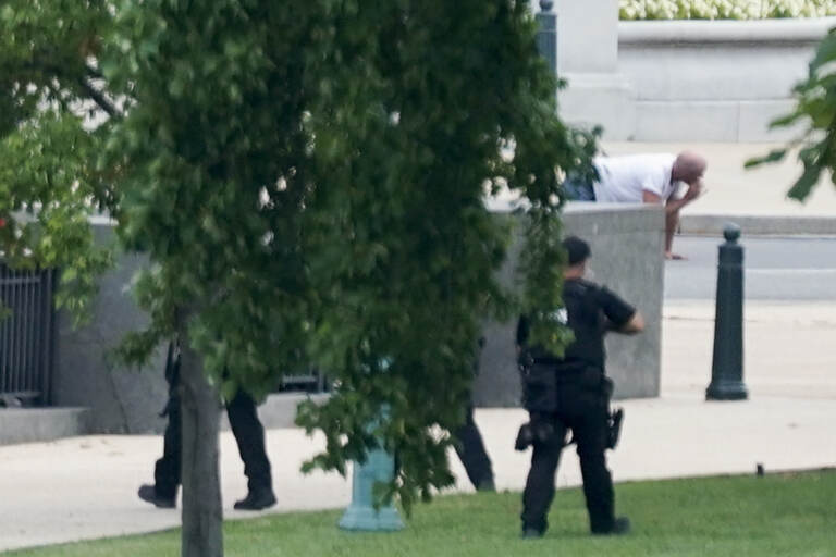 Floyd Ray Roseberry is apprehended after being in a pickup truck parked on the sidewalk in front of the Library of Congress' Thomas Jefferson Building