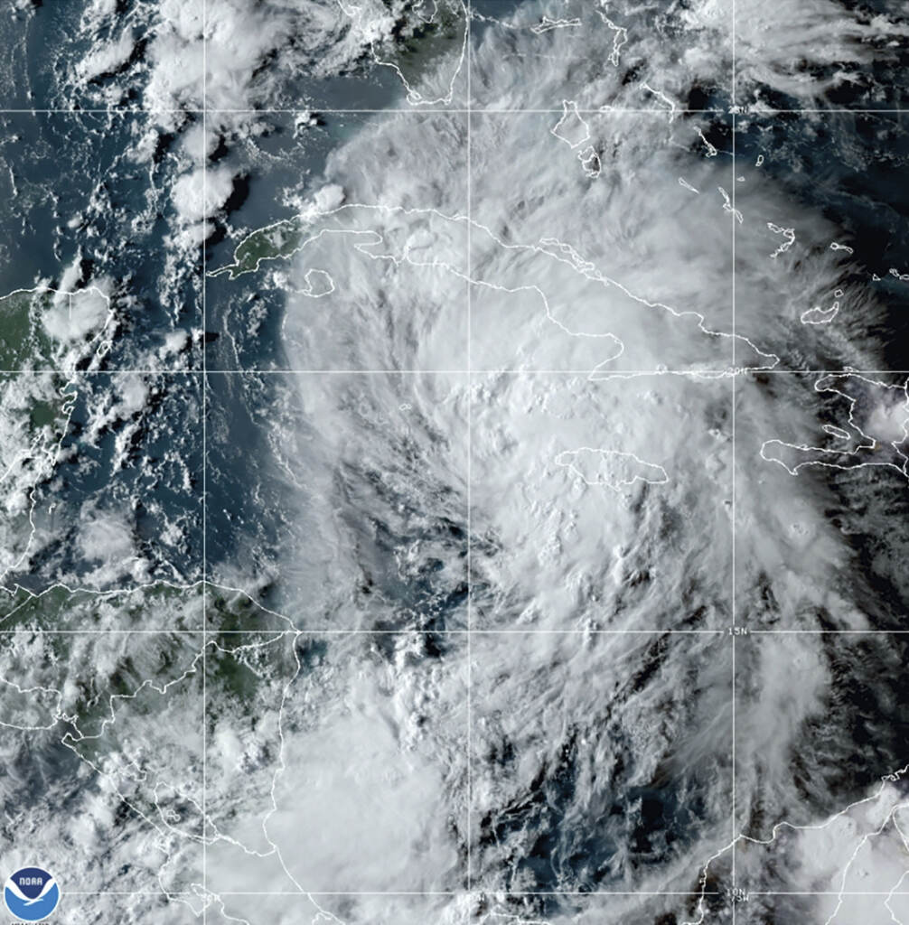 This GOES-16 East GeoColor satellite image taken Thursday, Aug. 26, 2021, at 10:20 p.m. EDT, shows Tropical Storm Ida in the Caribbean Sea