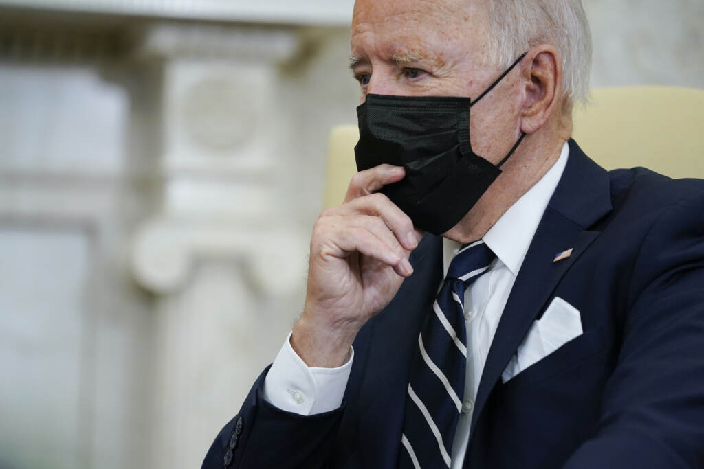 President Joe Biden listens as he meets with Israeli Prime Minister Naftali Bennett in the Oval Office of the White House, Friday, Aug. 27, 2021, in Washington