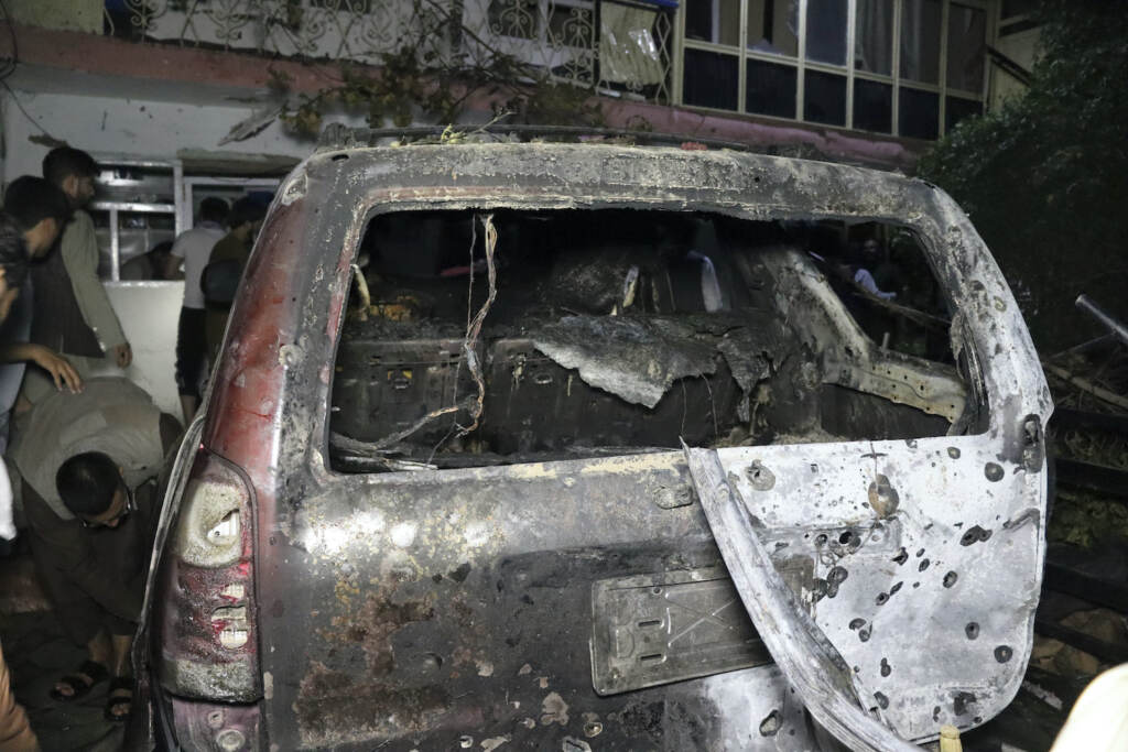 Afghanistan A destroyed vehicle is seen inside a house after a U.S. drone strike
