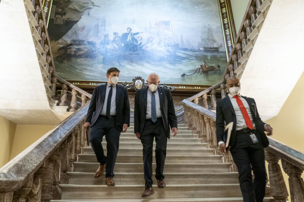 Bernie Sanders Bernie Sanders walks towards the Senate floor
