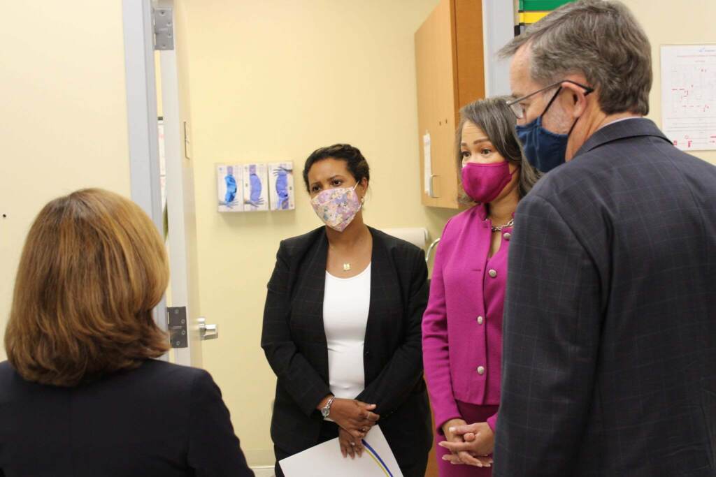 Centers for Medicare & Medicaid Services administrator Chiquita Brooks-LaSure (left) recently visited Westside Family Healthcare in Wilmington with Congresswoman Lisa Blunt Rochester (in purple) to announce new funding for navigators to help connect patients to insurance under the ACA