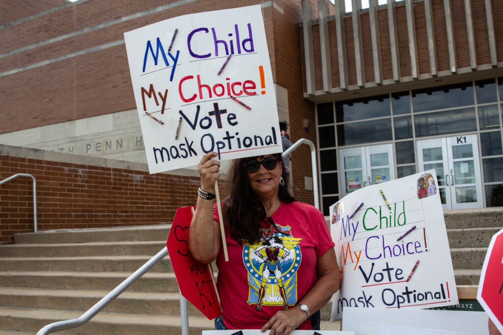 IMG_1418 A North Penn parent wishing to only be identified as 'mom', protested mask mandates outside the school board meeting on August 19, 2021. (Kimberly Paynter/WHYY)