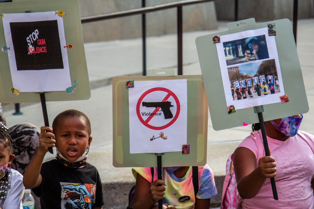 IMG_9879 File photo: A group of kids from the Southwest Philadelphia Healthnastics program, ages 3-18, held signs at a protest demanding the Kenney administration do more to address gun violence in the city on Aug. 4, 2021. (Kimberly Paynter/WHYY)