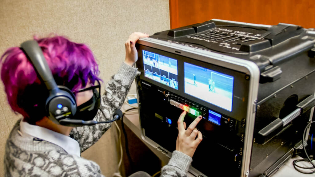 YCS-06-promo A teenage girl working on a broadcast monitor