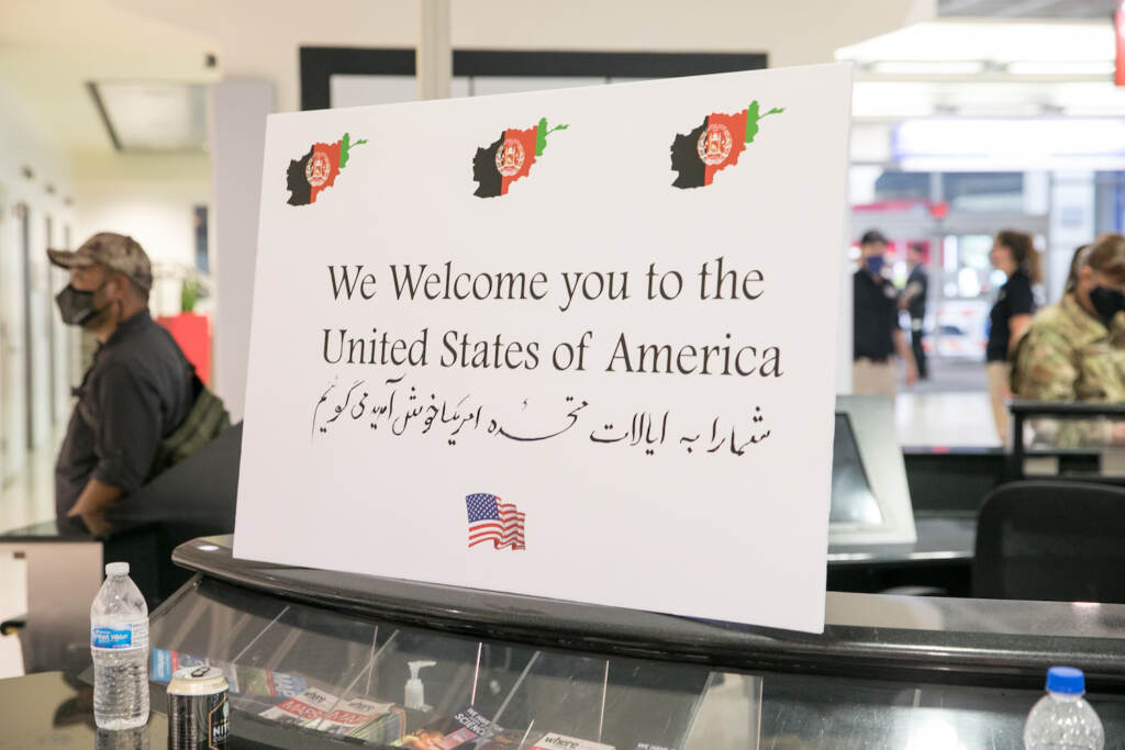afghan_refugees_evacuation_PHL_airport_082921_02 A sign welcomes Afghan refugees at PHL airport.