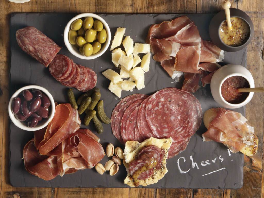 The Centers for Disease Control and Prevention is investigating two salmonella outbreaks that are tied to Italian meats like salami and prosciutto that are often used for charcuterie boards. The Centers for Disease Control and Prevention is investigating two salmonella outbreaks that are tied to Italian meats like salami and prosciutto that are often found in charcuterie boards. (Richard Drew/AP)