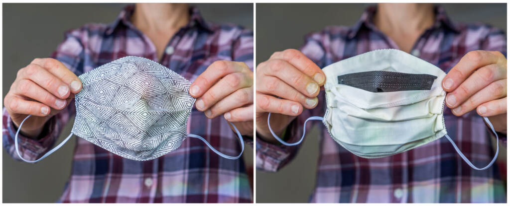 A woman displays the front and back of a mask that has a filter placed inside
