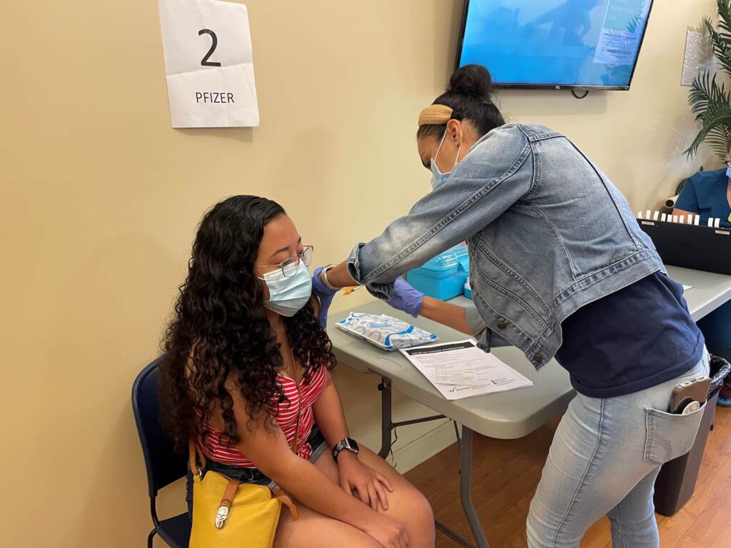 getting the shot Samantha Del Angel receives a COVID-19 vaccine