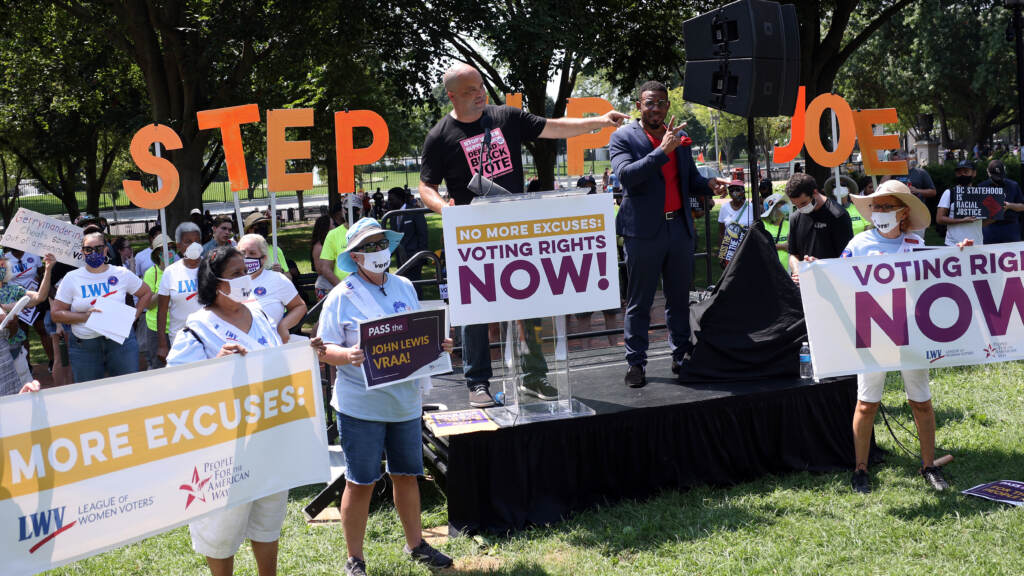 Civil rights leader Ben Jealous speaks at a voting rights rally outside the White House on Aug. 24 in Washington, D.C. Marches across the country are planned for Saturday. Demonstrators demand action on voting rights.