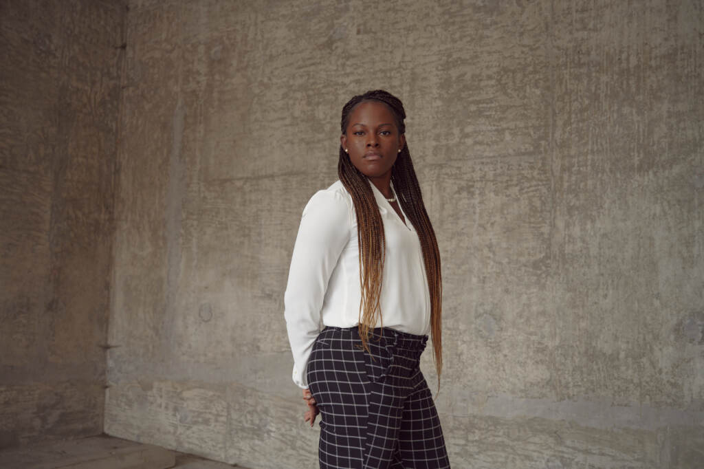 Crystal Ellington, a Black Army veteran, says she was disciplined for returning to base late after a flight delay, while white service members were given a pass for tardiness. Crystal Ellington, a Black Army veteran, says she was disciplined for returning to base late after a flight delay, while white service members were given a pass for tardiness. (Meron Menghistab for NPR)