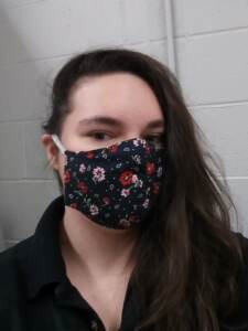 Rachel Baker wears a face mask