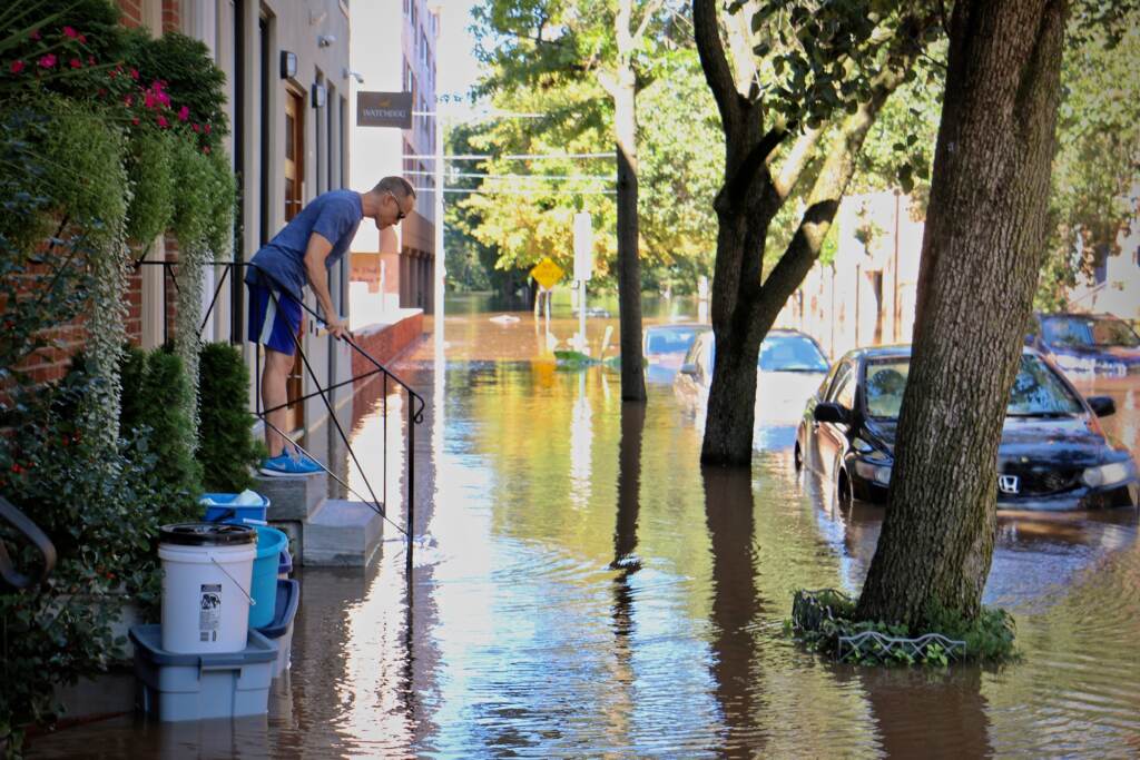 2021 09 02-e lee-philadelphia logan square 23rd street-flooding porch Person observes intense flooding in Philadelphia