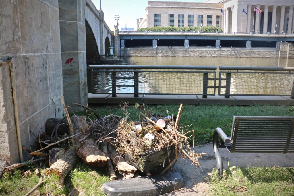 Debris stacked in a pile along the Schuylkill River Trail