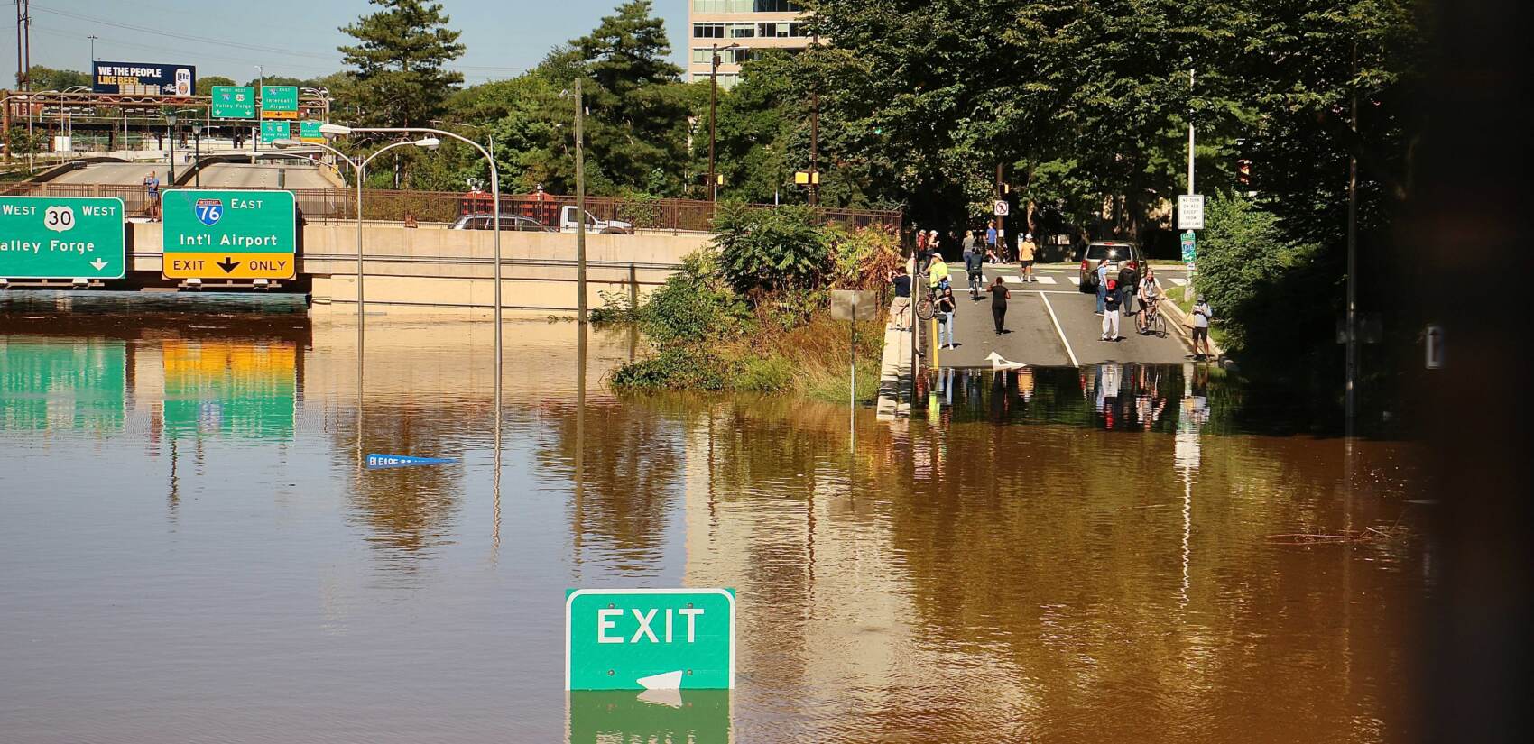 Flooding closes the Vine Street Expressway from Broad Street to the Schuylkill River.