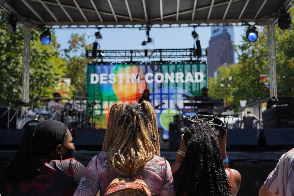 A band rehearses in front of a few early arrivals A band rehearses in front of a few early arrivals at the 2021 Made in America festival