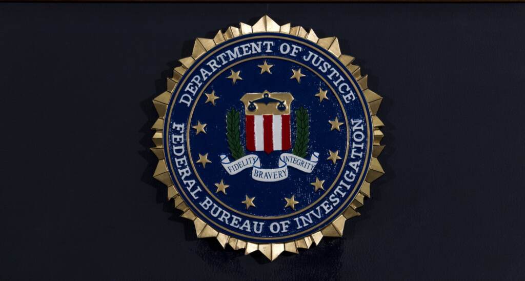 AP21162027208362-scaled-e1631646013360-1920×1027 FILE PHOTO: The FBI seal is seen before a news conference at FBI headquarters in Washington on June 14, 2018. (Jose Luis Magana / AP Photo)
