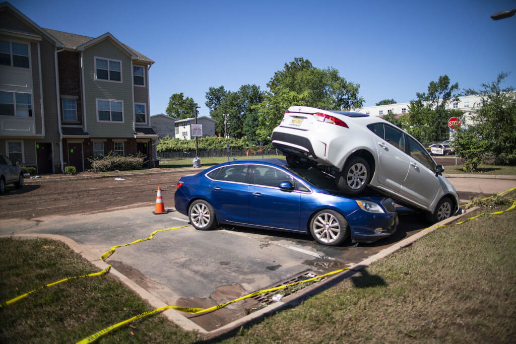 Tropical Weather New Jersey Cars are pilled after flooding as a result of the remnants of Hurricane Ida at Oakwood Plaza Apartments complex in Elizabeth, NJ., Thursday, Sept. 2, 2021. (AP Photo/Eduardo Munoz Alvarez)