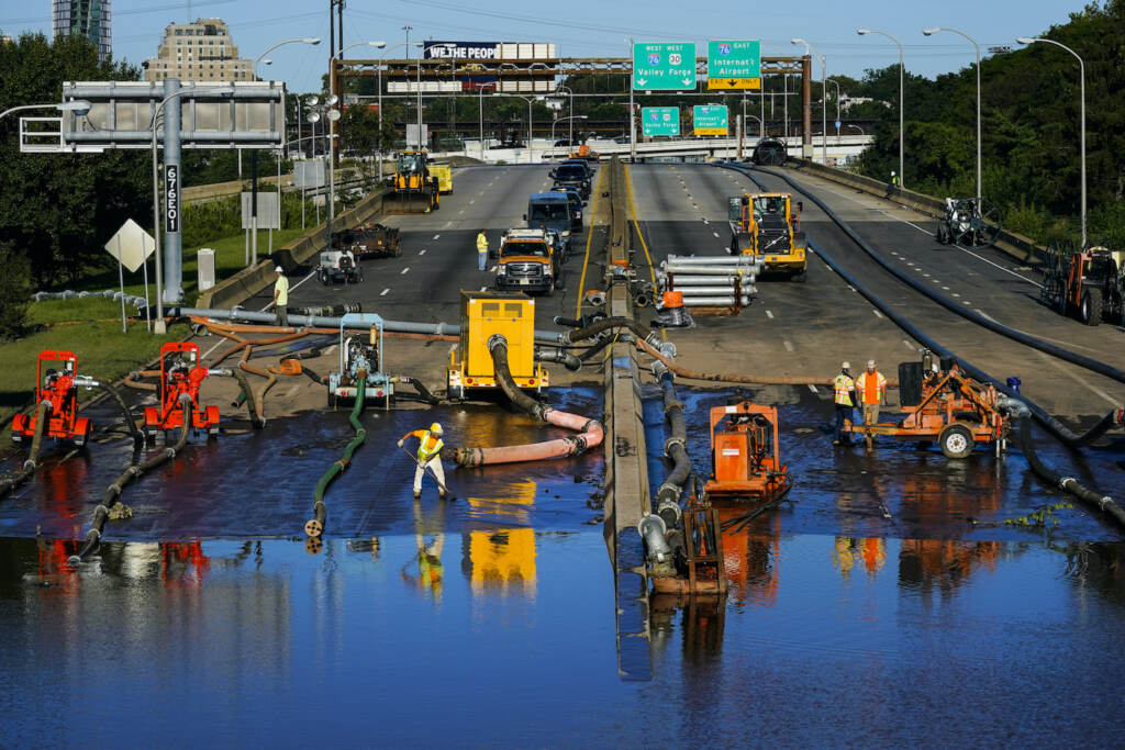 Tropical Weather Atlantic Workers pump water from a flooded section of Interstate 676 in Philadelphia Friday, Sept. 3, 2021