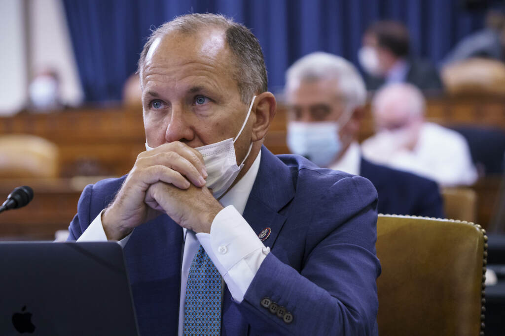 Lloyd Smucker Rep. Lloyd Smucker sits with his mask below his nose at a House hearing
