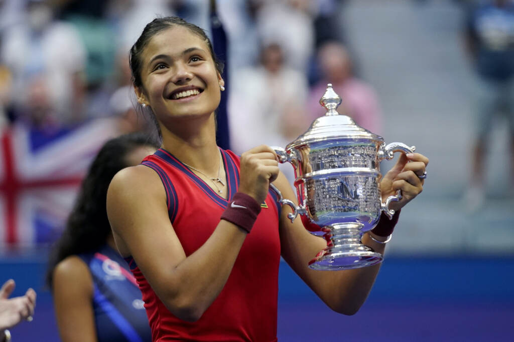 US Open Tennis Emma Raducanu, of Britain, holds up the US Open championship trophy after defeating Leylah Fernandez, of Canada, during the women’s singles final of the US Open tennis championships, Saturday, Sept. 11, 2021, in New York
