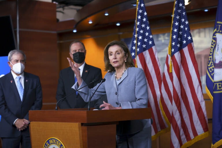 Speaker of the House Nancy Pelosi, D-Calif., joined from left by House Budget Committee Chair John Yarmuth, D-Ky., and House Intelligence Committee Chairman Adam Schiff, D-Calif., talks to reporters about the 