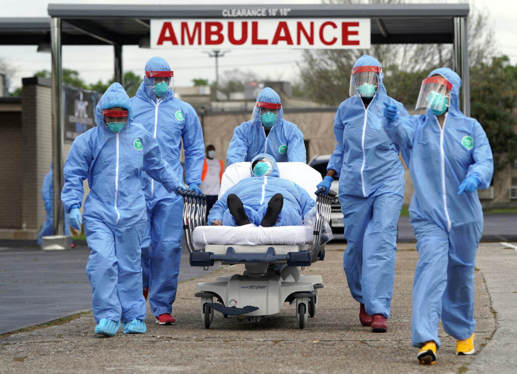 A person is taken on a stretcher into the United Memorial Medical Center