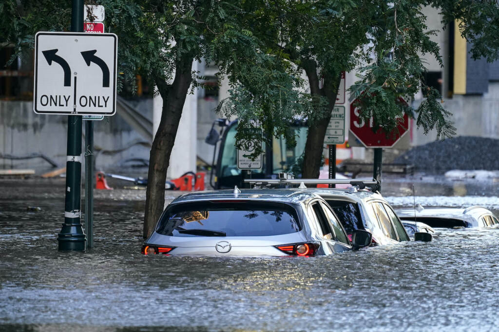 APTOPIX Tropical Weather Atlantic Cars are seen in a flooded area of Philly