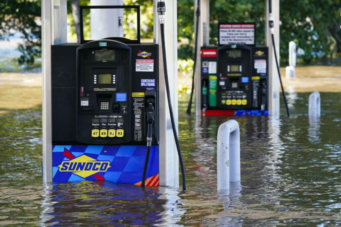Gas pumps are submerged in water