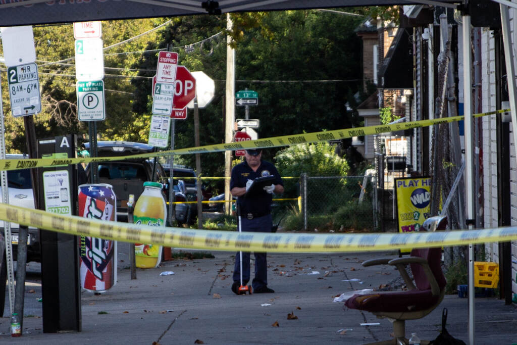 IMG_3154 A crime scene investigator works on the scene of a mass shooting