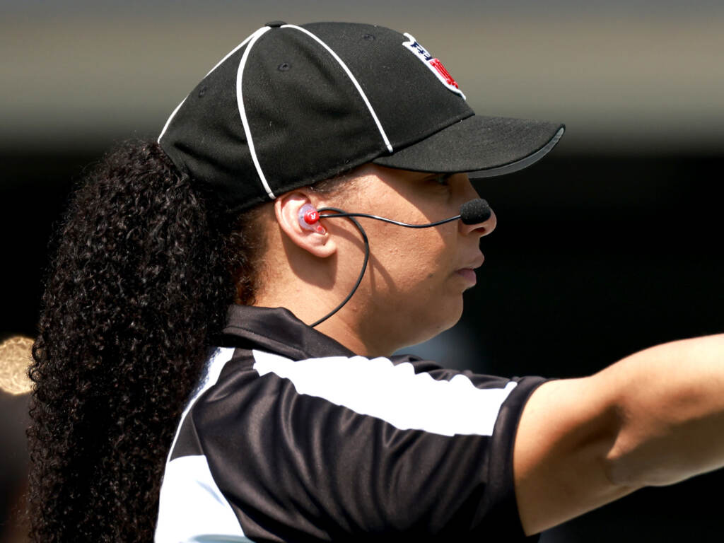 Line judge Maia Chaka signals during the game between the Carolina Panthers and the New York Jets at Bank of America Stadium on Sept. 12 in Charlotte, N.C. Chaka made history as the first Black woman to officiate an NFL game. Line judge Maia Chaka #100 signals during the game between the Carolina Panthers and the New York Jets at Bank of America Stadium on September 12, 2021 in Charlotte, North Carolina. (Photo by Grant Halverson/Getty Images)