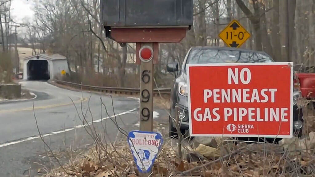 Signs-protesting-PennEast-pipeline A sign reads,