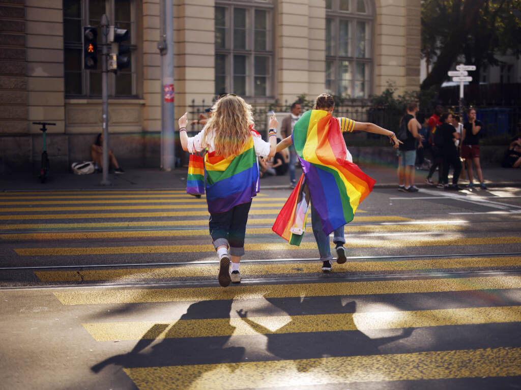 In this Saturday, Sept. 4, 2021 file photo, people take part in the Zurich Pride parade in Switzerland. Swiss voters will wrap up a referendum on Sept. 26, 2021, to decide whether to allow same-sex marriage.
