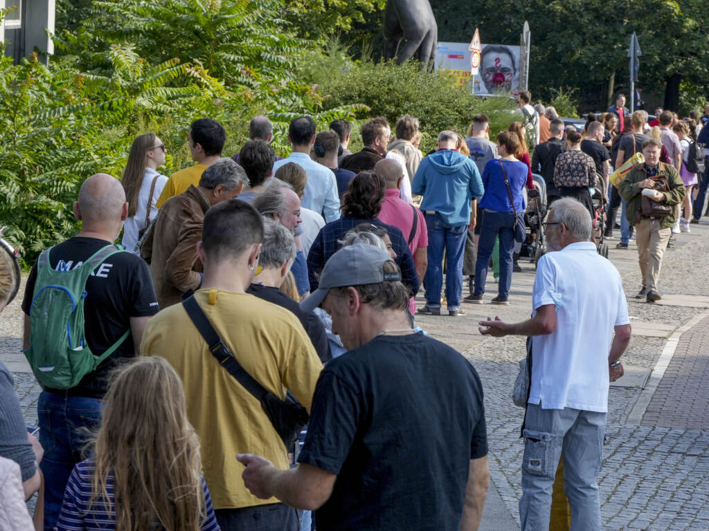 People queue in front of a polling station in the Moabit district of Berlin, Germany. German voters are choosing a new parliament in an election that will determine who succeeds Chancellor Angela Merkel after her 16 years at the helm of Europe’s biggest economy.