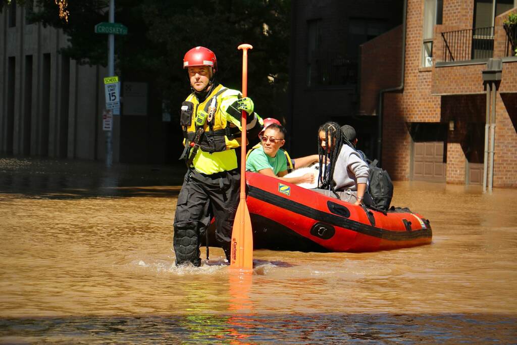 arch_street_water_rescue_hurricane_ida_EL_090221_01 Philadelphia Fire Department personnel carry residents of the River Walk apartments to dry land