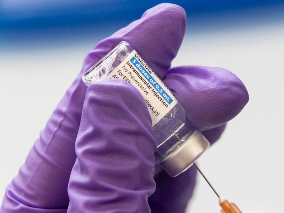 The COVID-19 vaccine from Johnson & Johnson was a one-shot regime. But data shows that people who got the shot may have waning immunity, and some doctors say a second shot would be a good idea. A health care worker loads a syringe with the COVID-19 J&J vaccine.