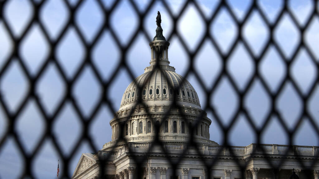 The U.S. Capitol Dome is seen through security fencing in May. Similar barriers will be in place on Saturday, when a demonstration is planned in support of people charged for the Jan. 6 pro-Trump attack on the Capitol. The U.S. Capitol Dome is seen through security fencing in May. Similar barriers will be in place on Saturday, when a demonstration is planned in support of people charged for the Jan. 6 pro-Trump attack on the Capitol. (Chip Somodevilla/Getty Images)