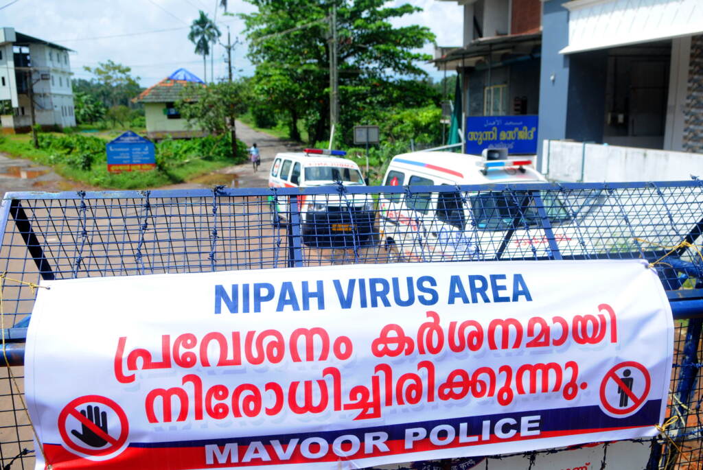 A road blockade set up during the Nipah virus outbreak in India this month. Kozhikode, India - September 08: (BILD ZEITUNG OUT) Road blockade due to Nipah affected areas at Chathamangalam panjayat on September 08, 2021 in Kozhikode, India. (Photo by C. K Thanseer/DeFodi images via Getty Images)