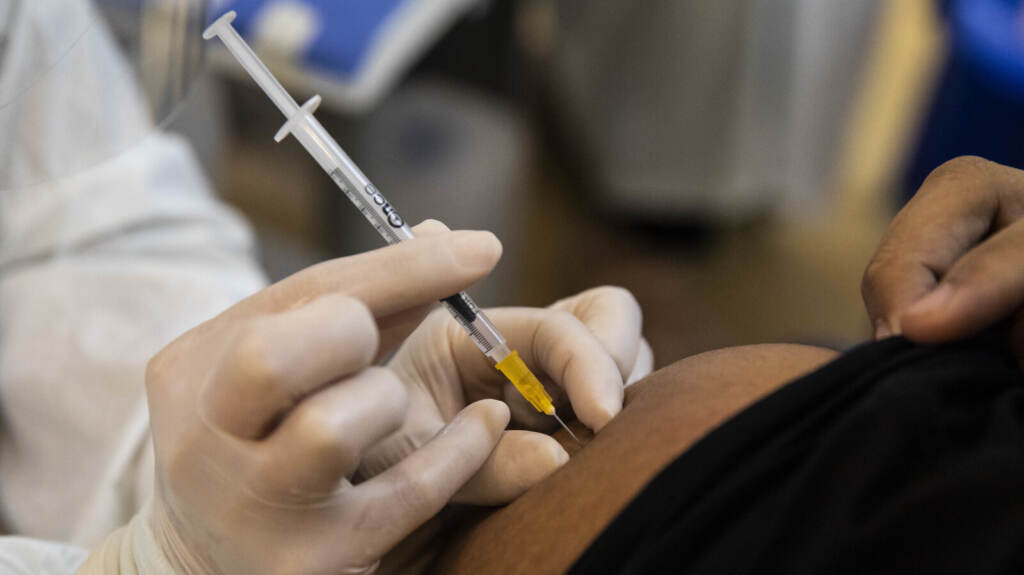 Thailand Vaccinates 12-18 Years Olds With Pfizer Vaccine A person receives a dose of the COVID-19 vaccine