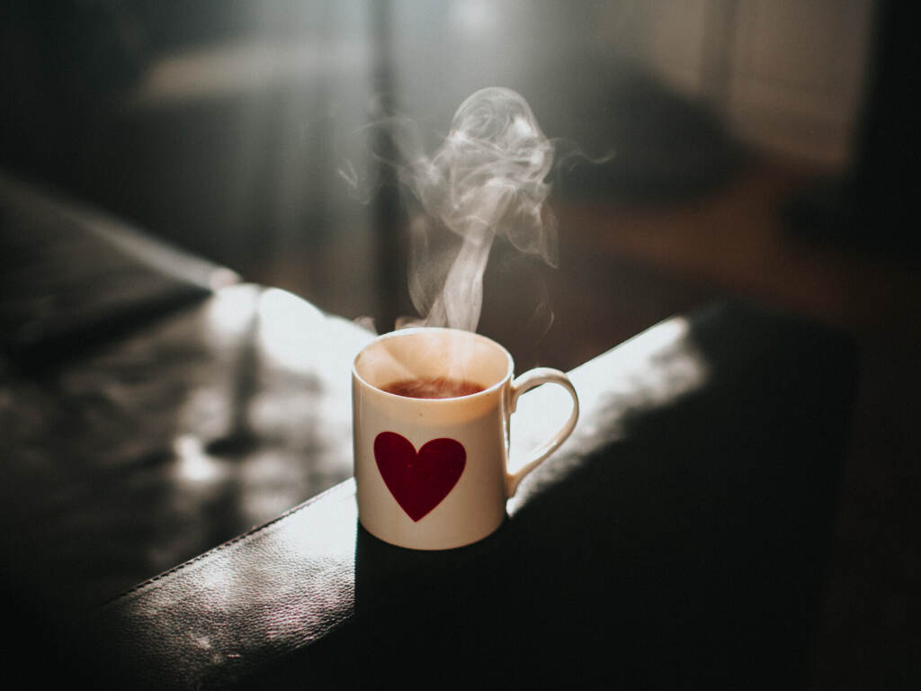 Hot Cup of tea Steam is seen coming off of a hot cup of tea