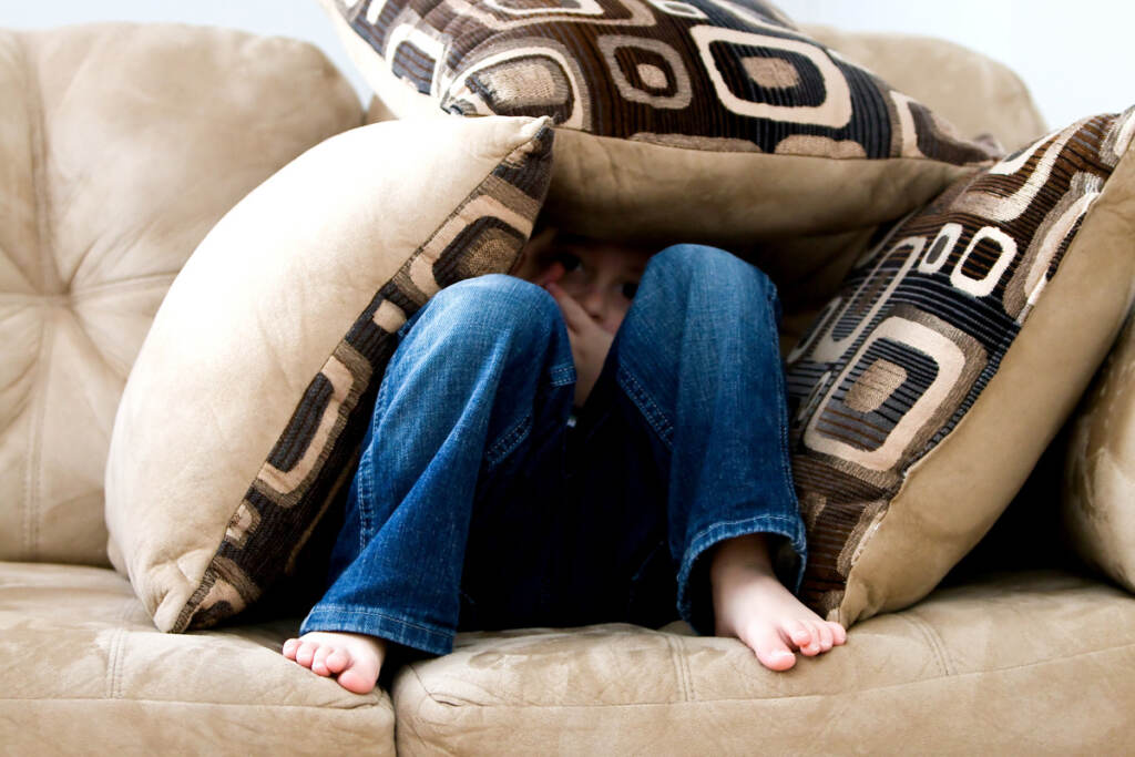 kid_on_couch_1200 The pandemic continues to take a toll on children’s mental health. (Image via Pexels)