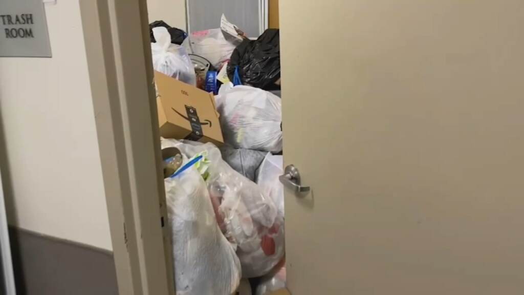 off-campus_housing_trash_wpvi_0902921 A trash room is pictured with overflowing trash